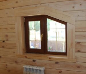 Установка окон и дверей в доме из бруса